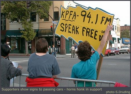Signs greeting passing cars - KPFA Demonstration