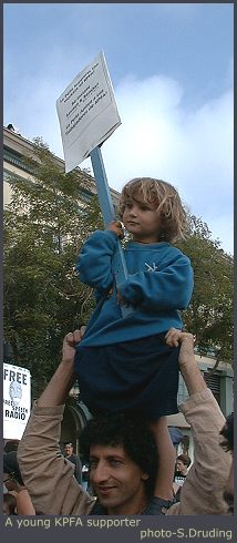 Young supporter with picket sign
